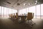 An empty conference room with arranged chairs